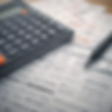 A close-up of a calculator, budget sheets, and a pen, representing insurance cost analysis.